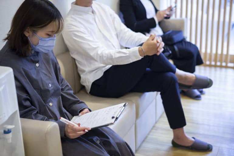 Patients waiting to be seen at a clinic in Japan