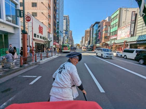 rickshaw-guide-showing-us-around-tokyo